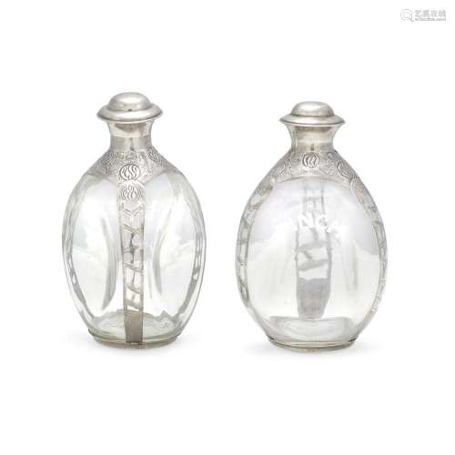 A PAIR OF MEXICAN STERLING SILVER OVERLAY GLASS BOTTLES 20th...