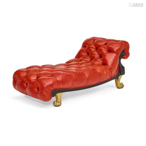 AN EGYPTIAN REVIVAL STYLE RED LEATHER UPHOLSTERED EBONIZED A...