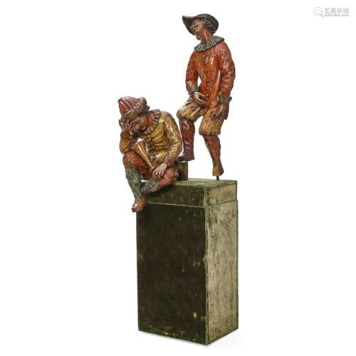 A PAIR OF ITALIAN POLYCHROMED CARVED WOOD FIGURES