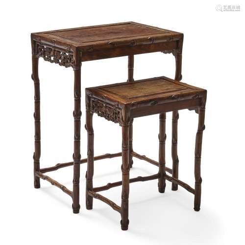 A SET OF TWO CHINESE HARDWOOD NESTING TABLES20th century
