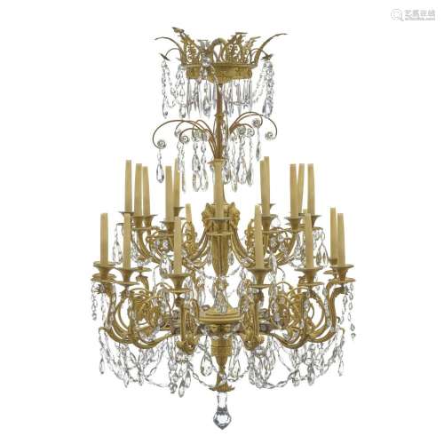 A DIRECTOIRE GILT BRONZE AND GLASS TWENTY-FOUR LIGHT CHANDEL...