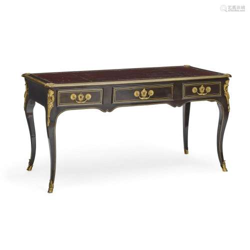 A LOUIS XV LEATHER INSET GILT BRONZE MOUNTED AND BRASS INLAI...