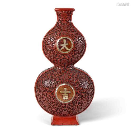 A CHINESE CINNABAR LACQUERED 'DAJI' DOUBLE GOURD VAS...