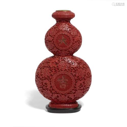 A CHINESE CINNABAR LACQUERED 'DAJI' DOUBLE GOURD VAS...