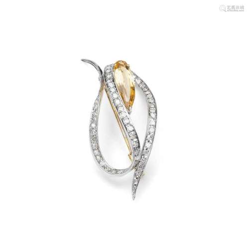 A yellow topaz and diamond brooch