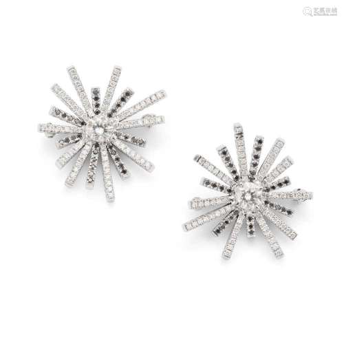 A pair of black and colourless diamond brooches