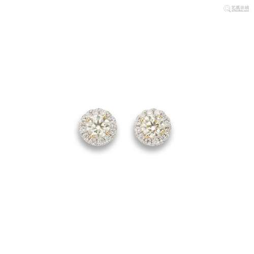 A pair of yellow and colourless diamond cluster earrings