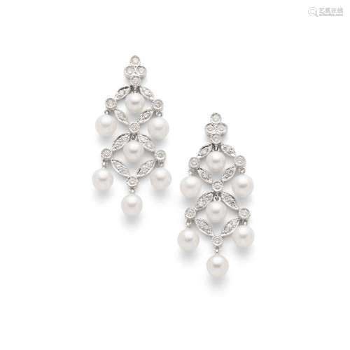 A pair of pearl and diamond pendent earrings