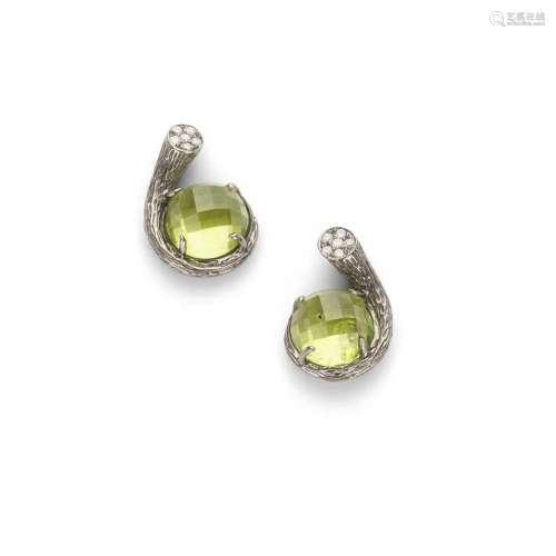 A pair of peridot and diamond earrings