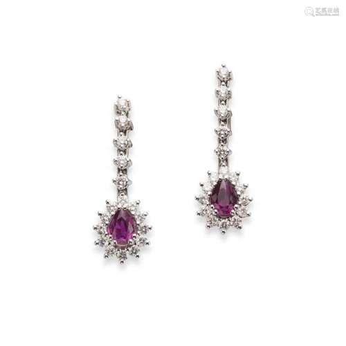 A pair of ruby and diamond pendent earrings