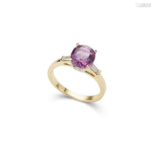 A pink sapphire and diamond ring