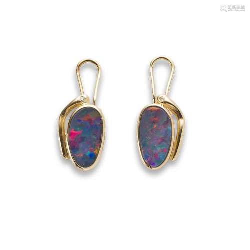 A pair of opal and diamond earrings
