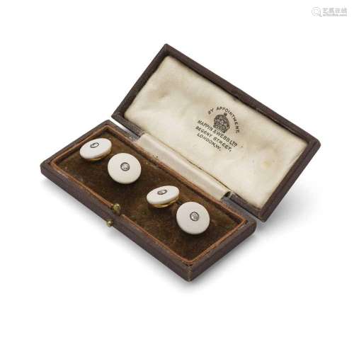 Y A pair of carved shell and diamond cufflinks