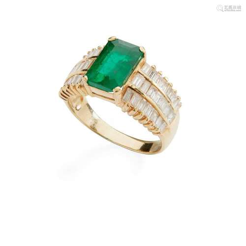 An emerald and diamond ring