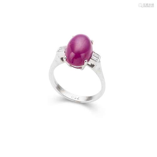 A cabochon ruby and diamond ring