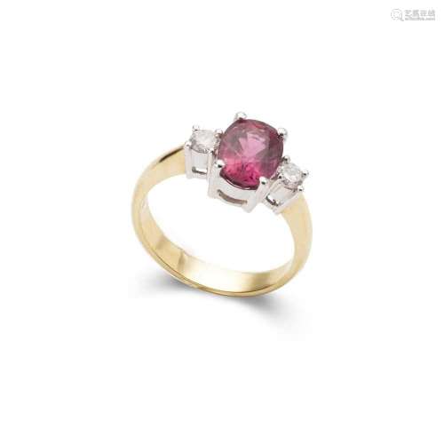 A pink tourmaline and diamond three-stone ring