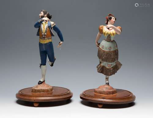 Pair of Malagueño barros, mid-19th century."Dancers wit...