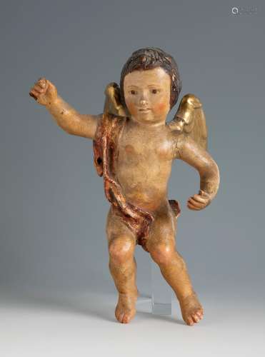 Angel. Baroque style, pps. 19th century.Gilded and polychrom...