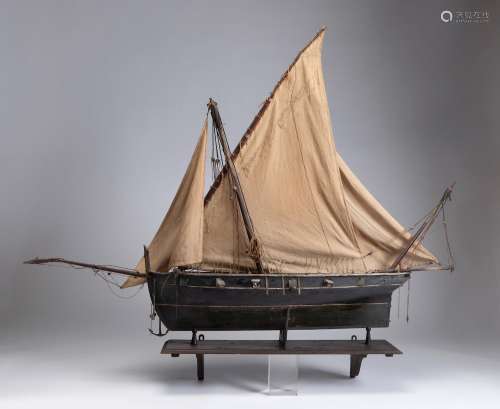 Model of a large sailing ship, 19th century.Wood and fabric....