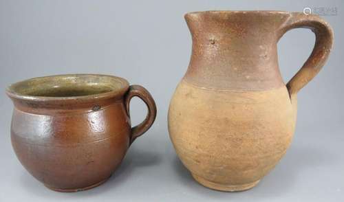 An eighteenth century glazed brown ware handled pot and jug,...