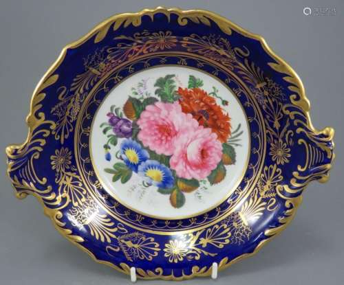 An early nineteenth century porcelain two-handled dessert di...