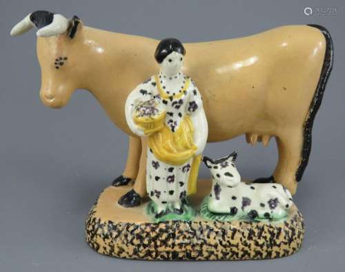 An early nineteenth century Yorkshire pottery cow group deco...