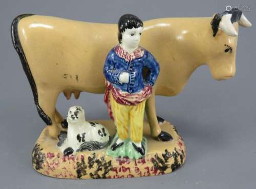 An early nineteenth century Yorkshire pottery cow group deco...