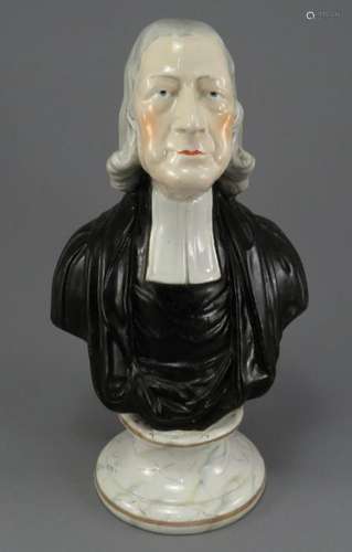 An early nineteenth century pearlware figure of John Wesley,...