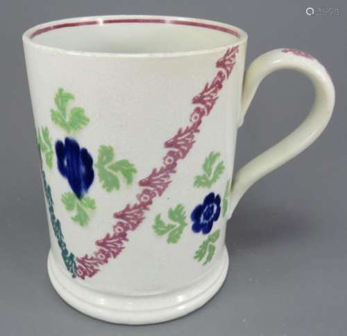 An early nineteenth century pearlware spongeware tankard, tr...