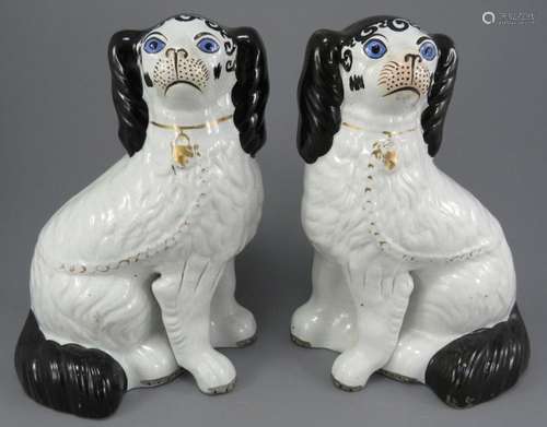 A pair of mid-nineteenth century Staffordshire Disraeli dogs...