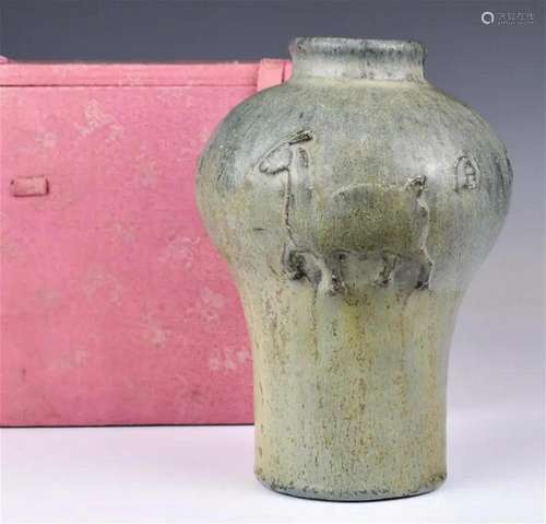 A Shiwan Kiln Celadon-Glazed Vase