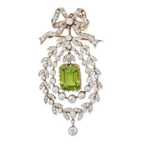 A FINE ANTIQUE BELLE EPOQUE PERIDOT AND DIAMOND BROOCH / PEN...