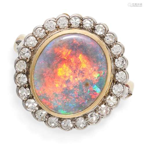 AN OPAL AND DIAMOND CLUSTER RING in 18ct yellow gold, set wi...