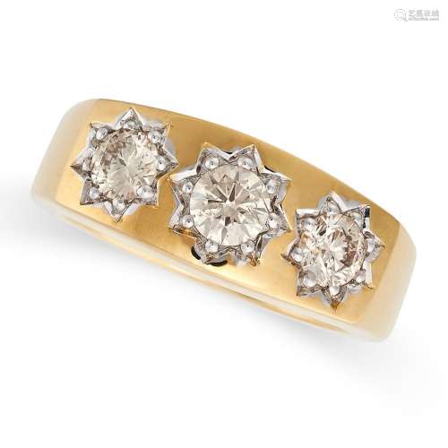 A DIAMOND THREE STONE RING in 9ct yellow gold, set with thre...