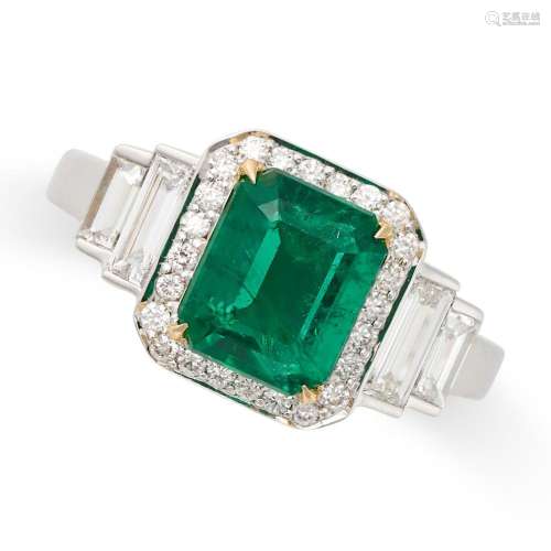 AN EMERALD AND DIAMOND RING in 18ct white gold, set with an ...