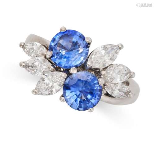 A SAPPHIRE AND DIAMOND DRESS RING in 18ct white gold, set wi...