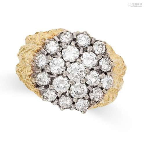 A VINTAGE DIAMOND CLUSTER RING in 18ct yellow gold, set with...