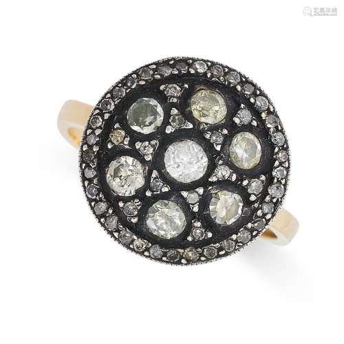 A DIAMOND CLUSTER RING the circular domed face set with a cl...