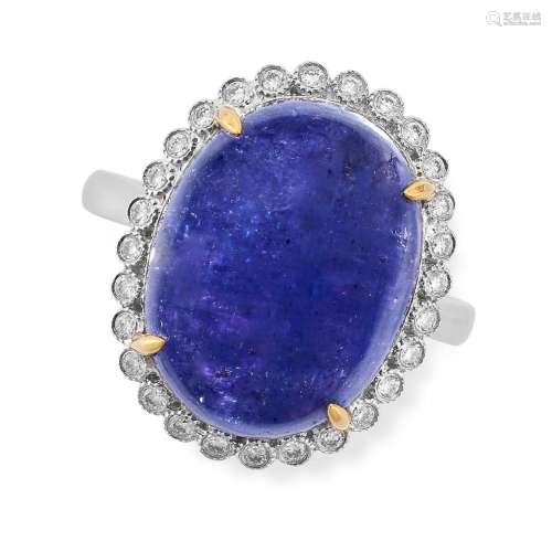 A TANZANITE AND DIAMOND CLUSTER RING in 18ct white gold, set...