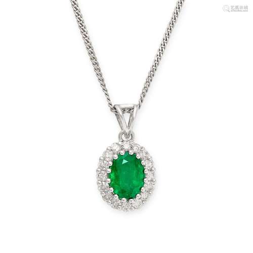 AN EMERALD AND DIAMOND PENDANT NECKLACE set with an oval cut...