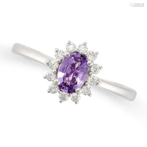 A PINK SAPPHIRE AND DIAMOND CLUSTER RING in 18ct white gold,...