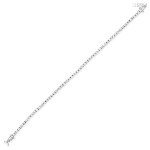 A DIAMOND LINE BRACELET in 18ct white gold, set with a row o...