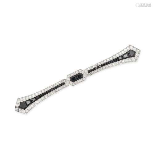 A FRENCH ART DECO ONYX AND DIAMOND BAR BROOCH in platinum, d...