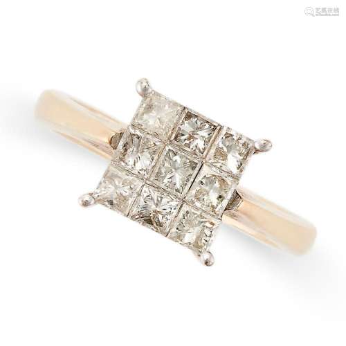 A DIAMOND CLUSTER RING in 9ct white and yellow gold, set wit...