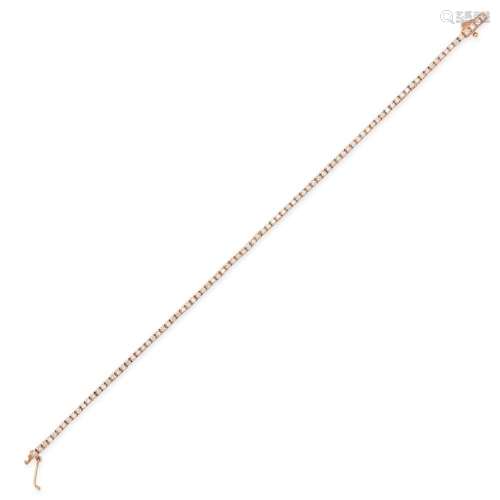 A DIAMOND LINE BRACELET in 18ct rose gold, set with a row of...