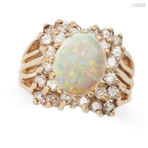 A VINTAGE OPAL AND DIAMOND RING in 14ct yellow gold, set wit...