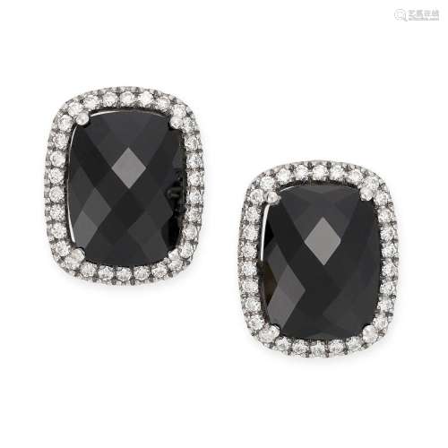 A PAIR OF ONYX AND DIAMOND STUD EARRINGS in 18ct white gold,...
