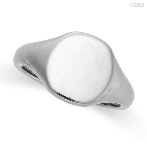 A GENTLEMAN S SIGNET RING in palladium, with plain oval face...