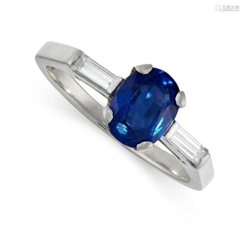 A SAPPHIRE AND DIAMOND RING set with an oval cut sapphire of...