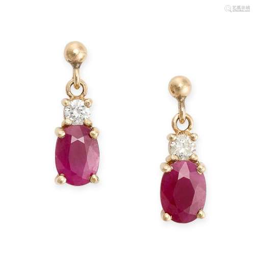 A PAIR OF RUBY AND DIAMOND DROP EARRINGS each set with a rou...